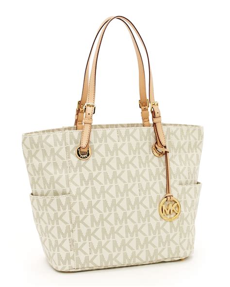 michael kors jet set logo print signature tote vanilla|Michael Kors airplane bag.